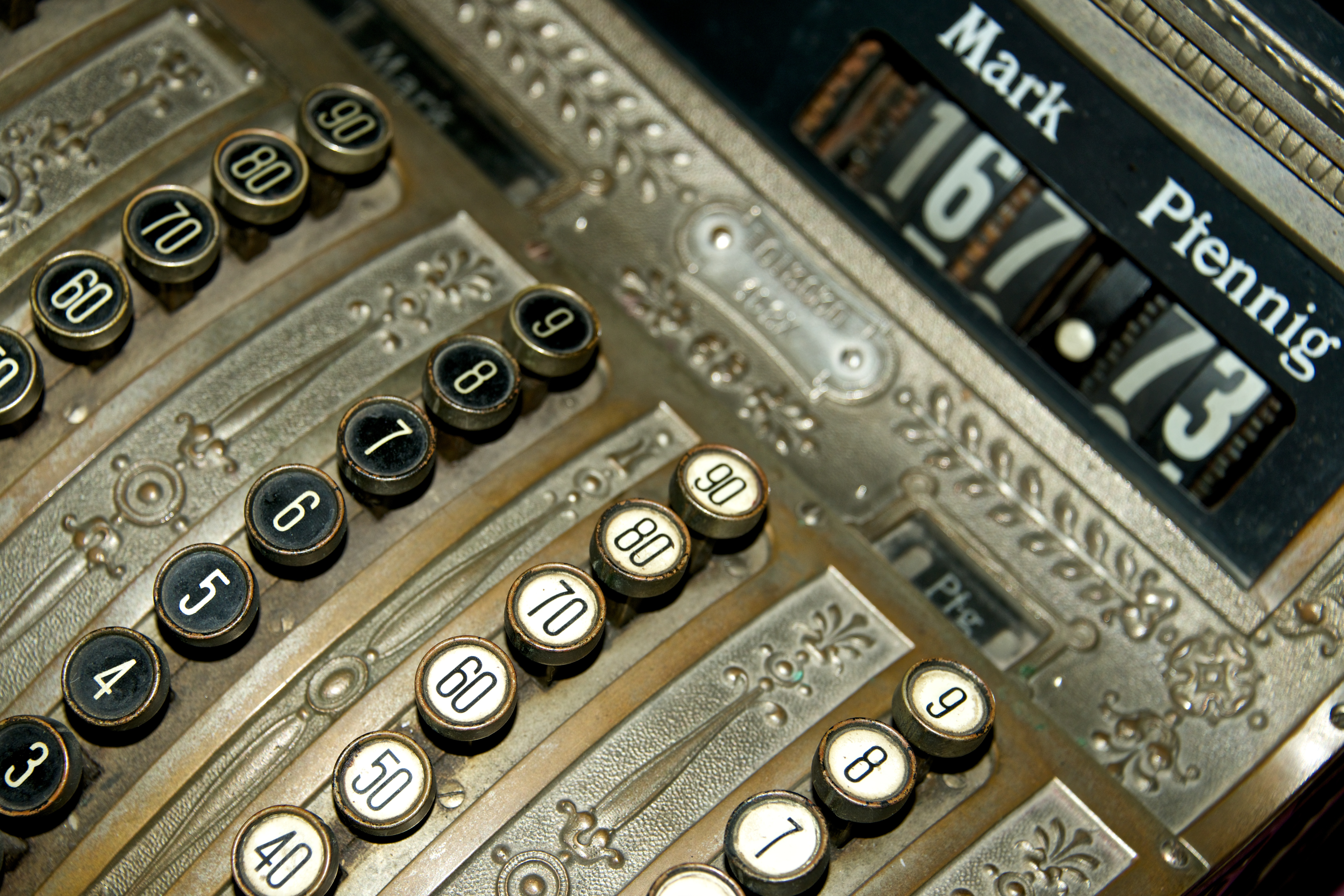 Angled view of old German cash register Nick Dale Private Tutor